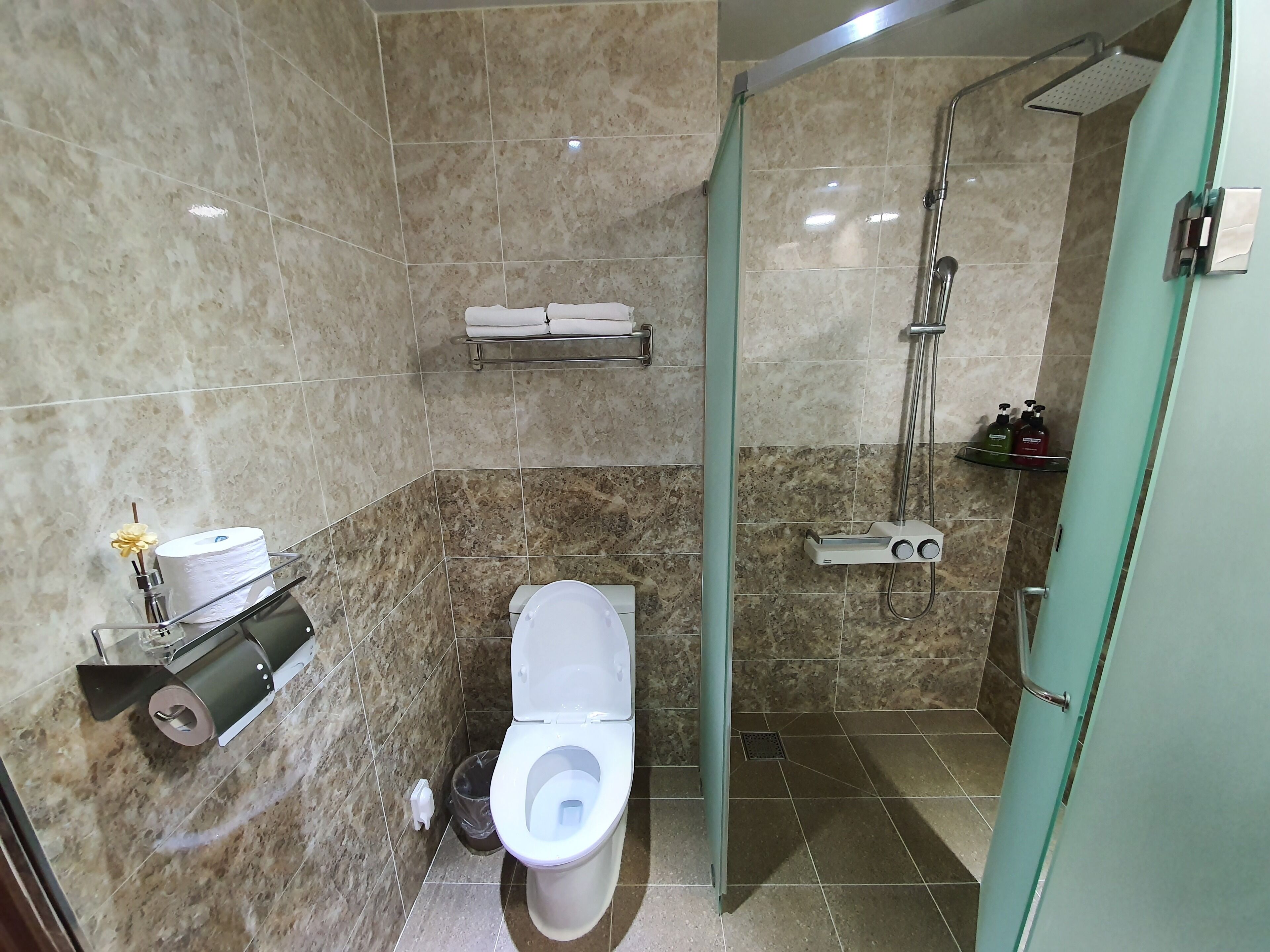 hair dryer, slippers, towels, soap