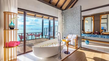 Water Villa with Private Pool | Bathroom | Separate tub and shower, rainfall showerhead, free toiletries