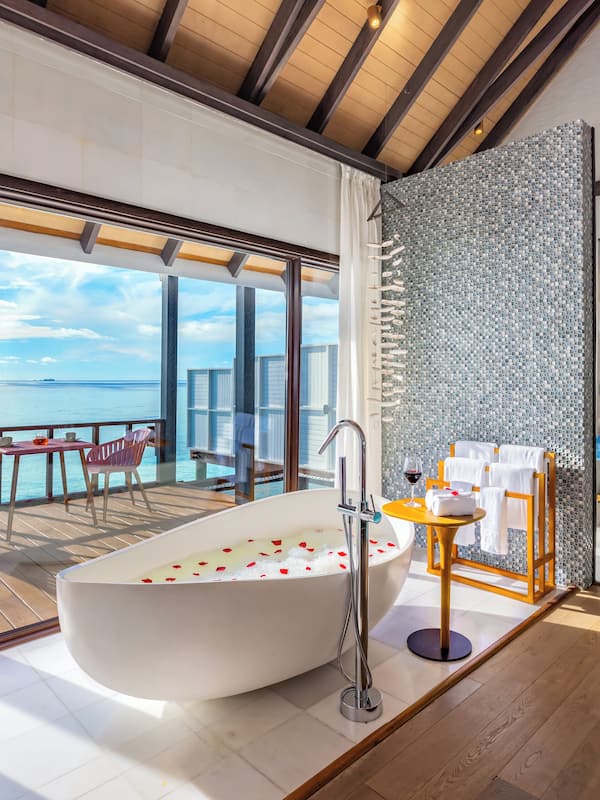 Water Villa with Private Pool | Bathroom | Separate tub and shower, rainfall showerhead, free toiletries