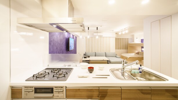 A modern kitchen with a built-in oven, a gas stove, and a stainless steel sink. - Hotel Axas Nihonbashi (Tokyo)