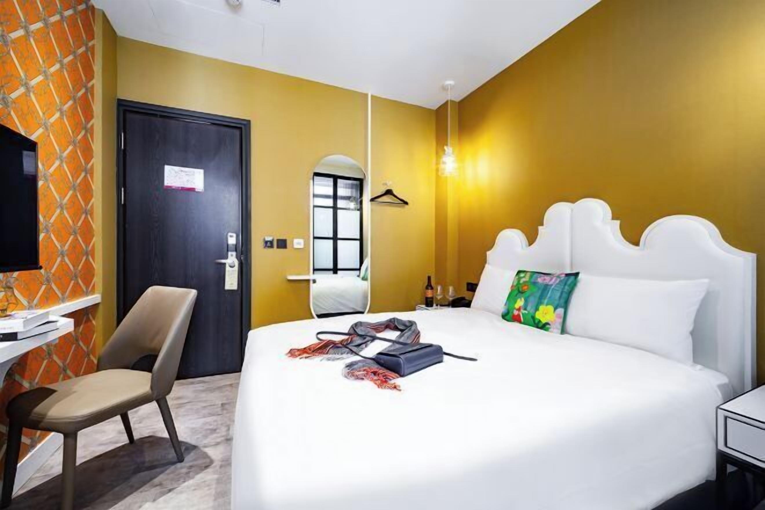 Desk, laptop workspace, blackout drapes, soundproofing