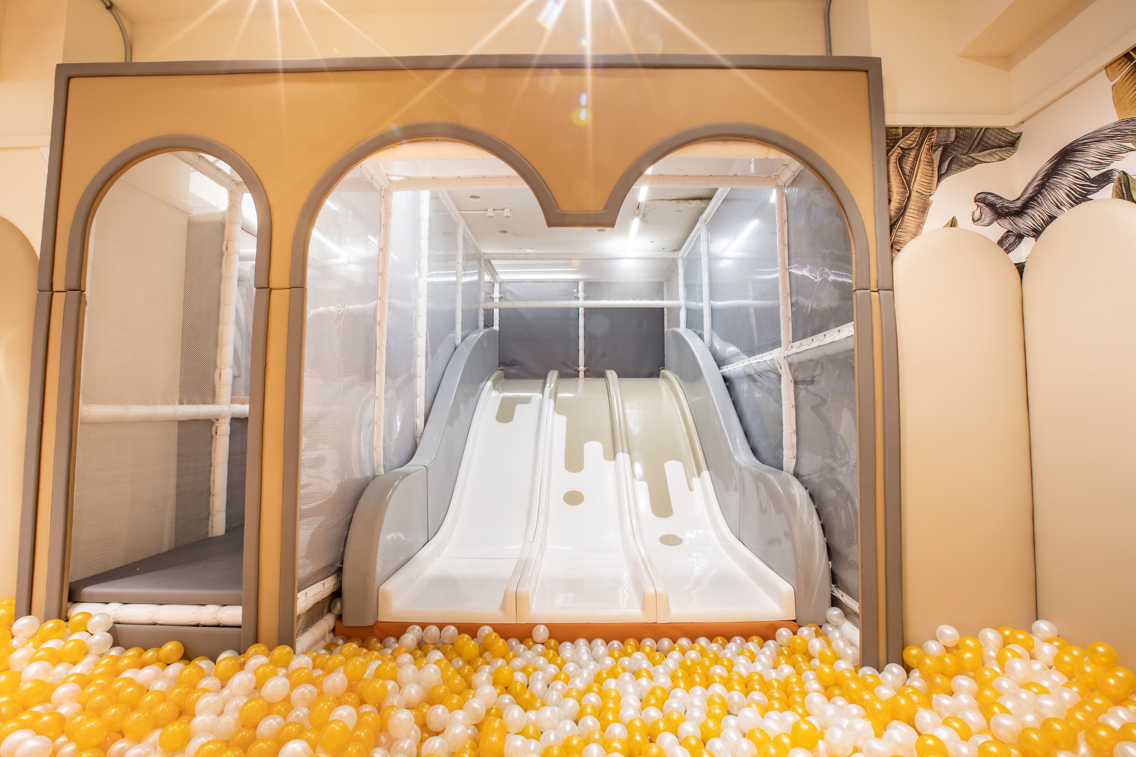 A slide with a ball pit at the bottom.