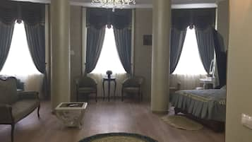 Luxury Room | Individually decorated, desk, blackout curtains, iron/ironing board