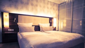 Deluxe-huoneisto, 3 makuuhuonetta, parveke, vuoristonäköala | Oleskelualue | Taulutelevisio