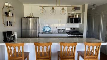 Condo, 1 Bedroom, Beach View, Beachfront | Private kitchen | Full-size fridge, microwave, oven, stovetop