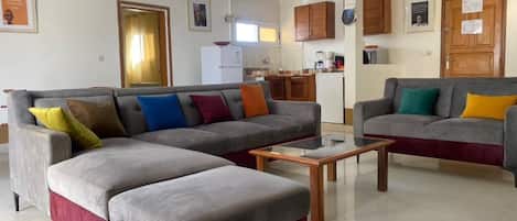 Studio, Sea View | Living room | 70-cm flat-screen TV with satellite channels, TV, printers