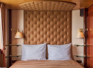 Ropa de cama de alta calidad y minibar 