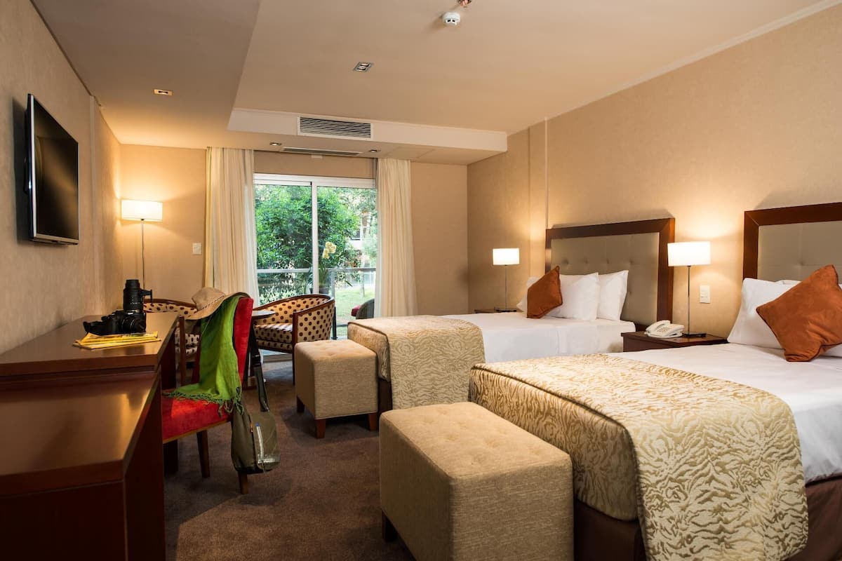 Premium bedding, down duvets, pillow-top beds, minibar