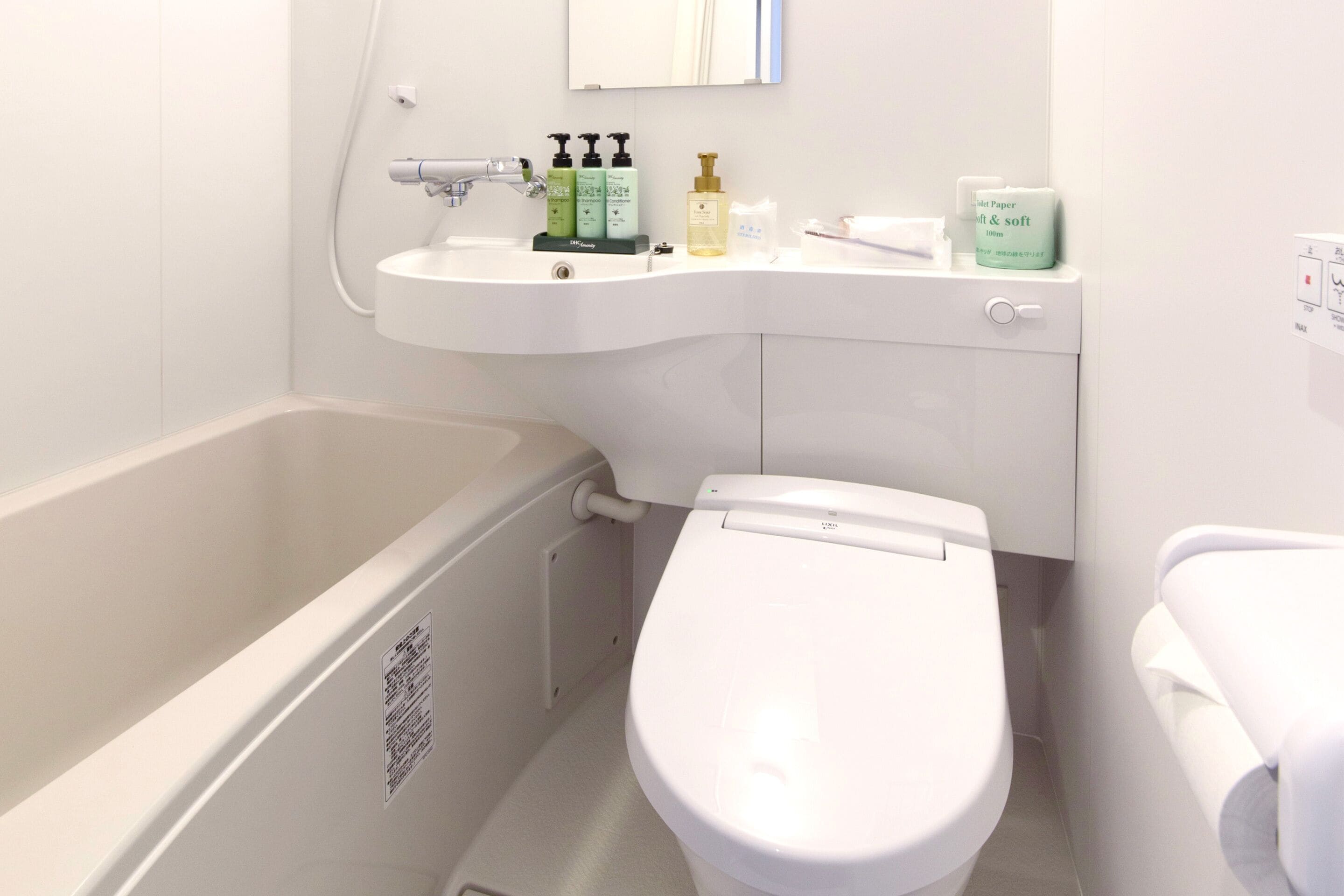 Combined shower/tub, hair dryer, slippers, electronic bidet