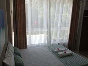 In-room safe, desk, blackout curtains, iron/ironing board - Seaview Holiday Apartments (Grand-Baie)