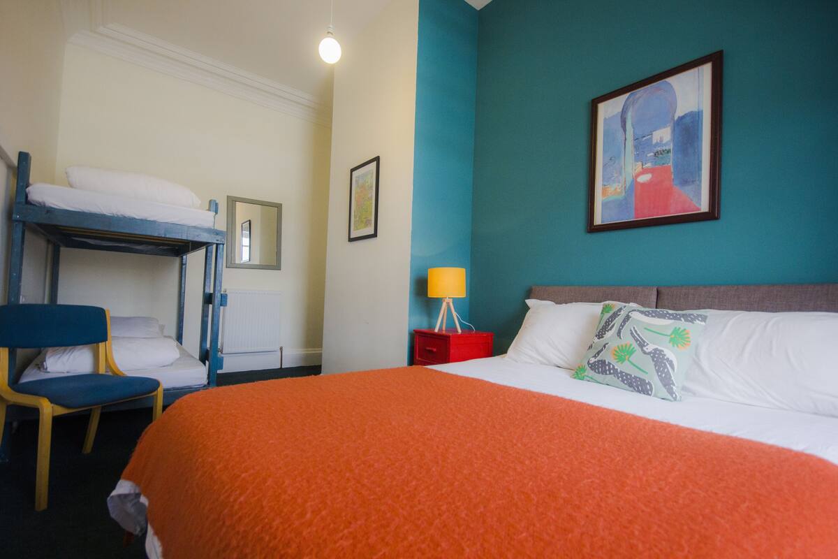 Family Quadruple Room | Blackout curtains, iron/ironing board, free WiFi, bed sheets