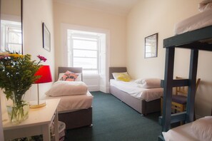 Family Quadruple Room | Blackout curtains, iron/ironing board, free WiFi, bed sheets