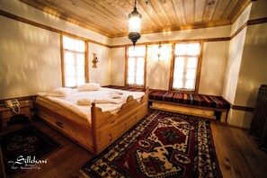 Traditional Quadruple Room | Premium bedding, minibar, in-room safe, individually decorated