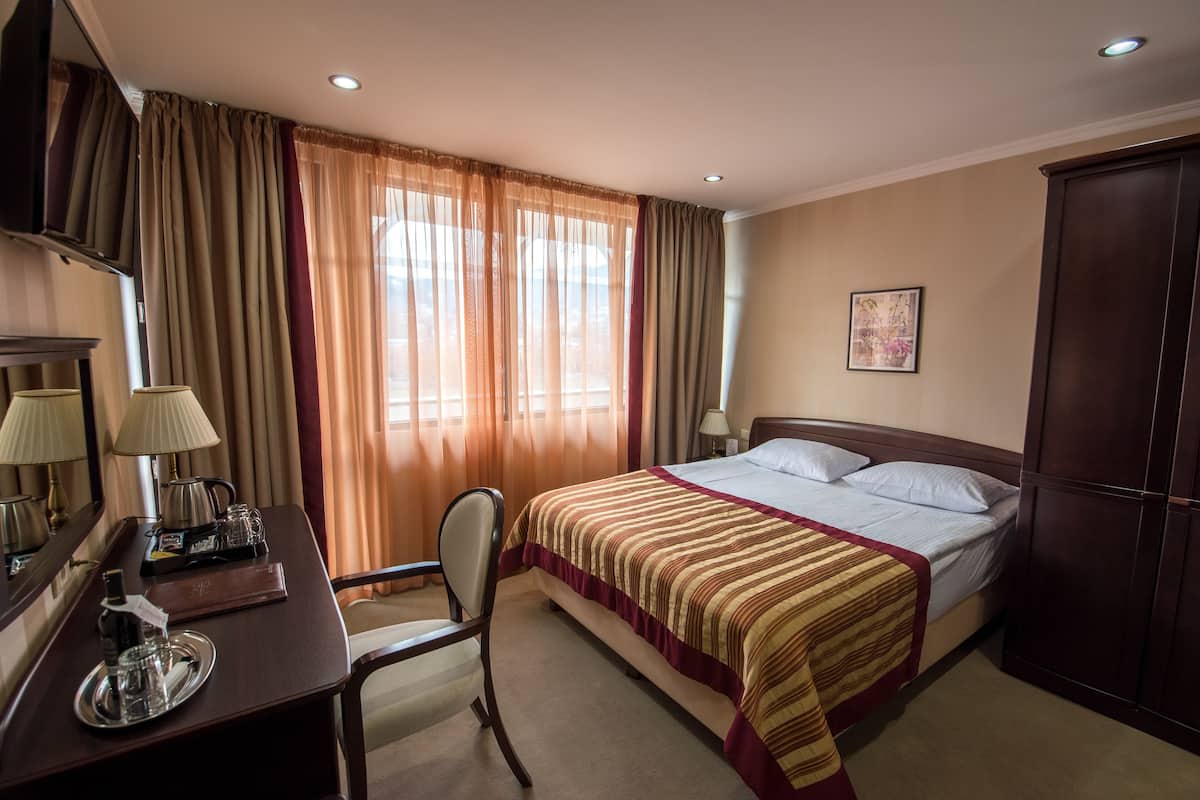 Standard Double Room, City View | Minibar, in-room safe, desk, soundproofing