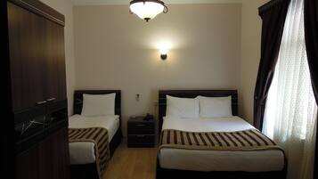 Triple Room | In-room safe, desk, soundproofing, free cribs/infant beds