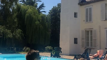 Seasonal outdoor pool, open 9:00 AM to 10:00 PM, free cabanas