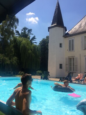 Seasonal outdoor pool, open 9:00 AM to 10:00 PM, free cabanas