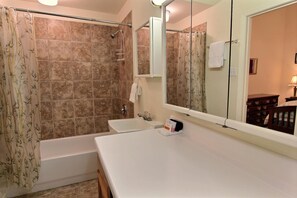 House, 2 Bedrooms | Bathroom | Combined shower/bathtub, towels - Stilts 310LL (Port Aransas)