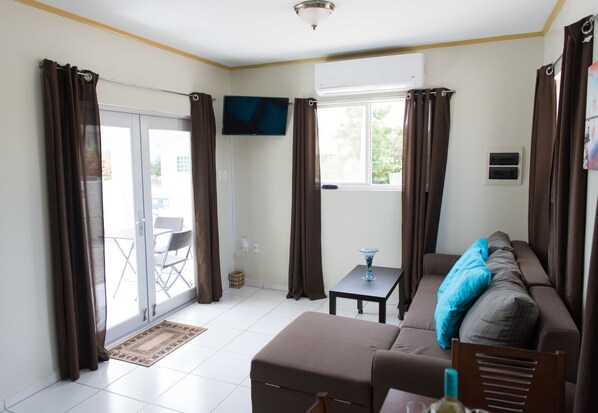 Deluxe Apartment, 1 Bedroom, Non Smoking, Kitchen | Living room - The Lush (Willemstad)