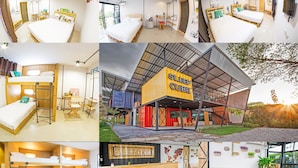 A modern hotel interior with bunk beds, a dining area, and a unique shipping container design. - Sleep Cube (Khon Kaen)