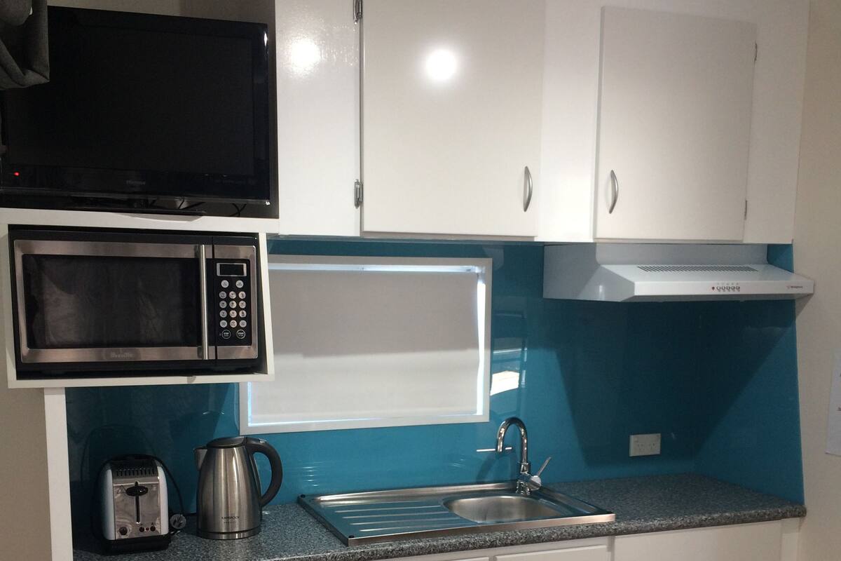 6-berth Cabin (Shared Bathroom) | Private kitchen | Fridge, microwave, stovetop, electric kettle