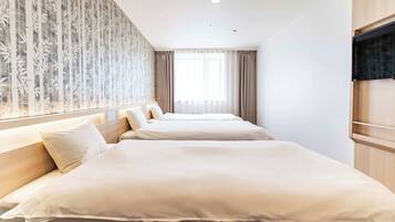 高级三人房, 3 间卧室, 无烟房 | 1 多间卧室、遮光窗帘、熨斗/熨板、免费 WiFi