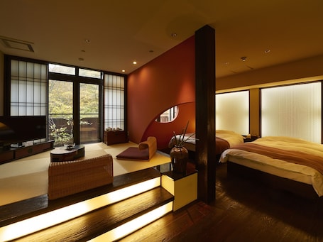 Suite - SAN-SUI-AN, Non-smoking | 1 bedroom, in-room safe, blackout drapes, iron/ironing board