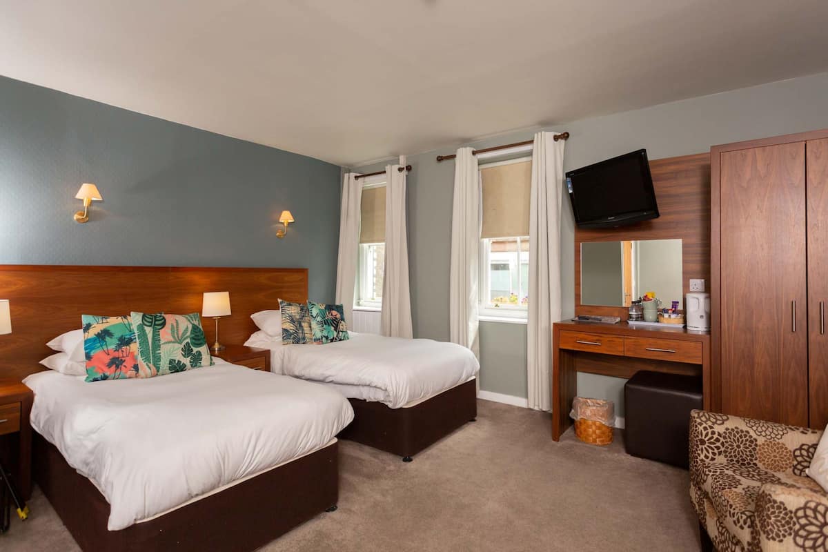 family room | iron/ironing board, free wifi, bed sheets