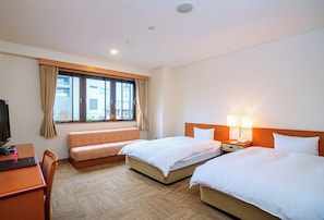 Twin Room | In-room safe, individually furnished, blackout drapes
