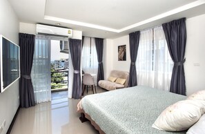 Deluxe Sea View | Blackout drapes, iron/ironing board, free WiFi, bed sheets