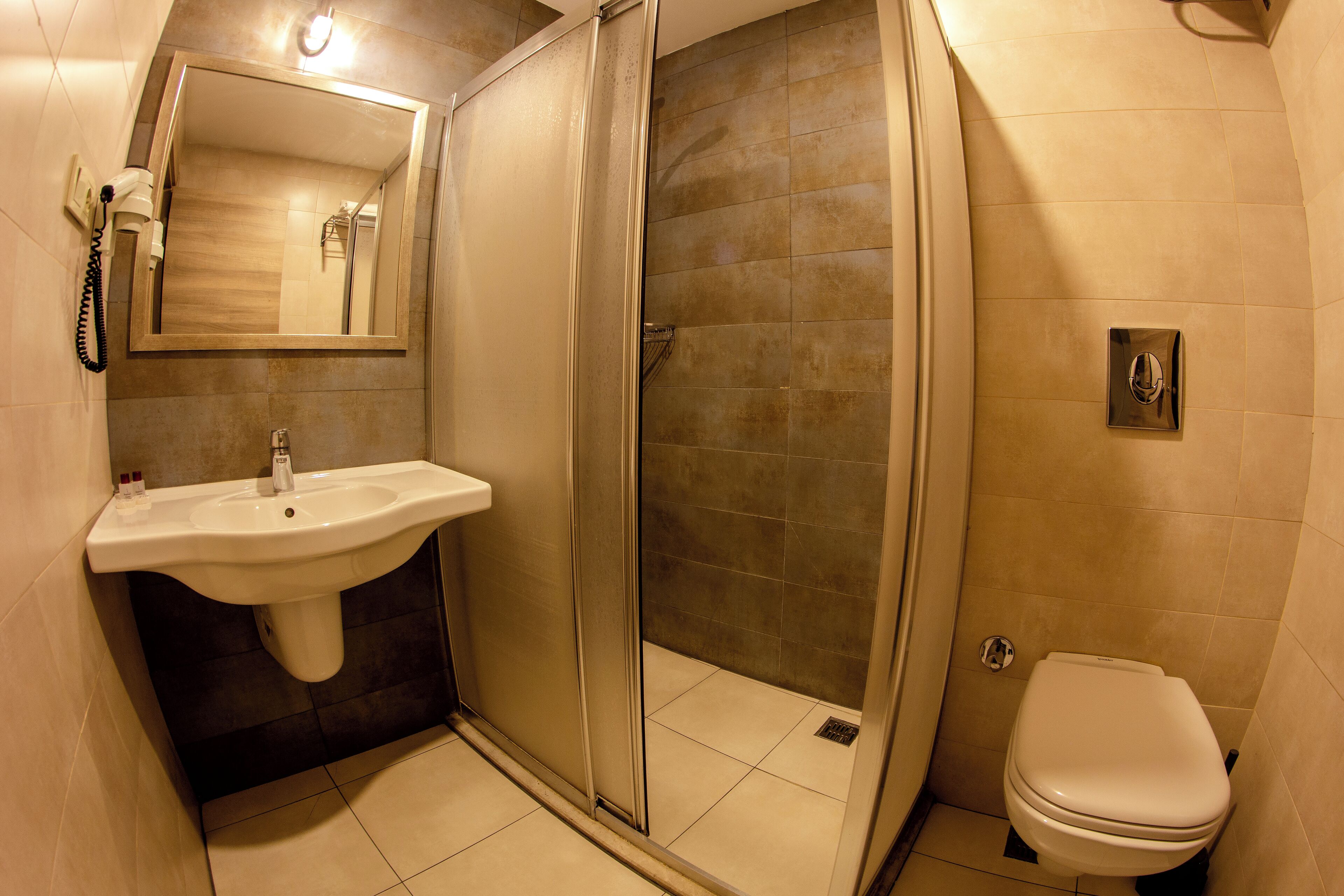 shower, free toiletries, hair dryer, slippers