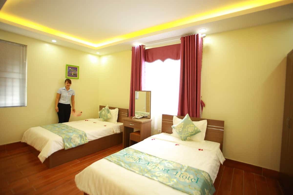Premium bedding, memory-foam beds, minibar, in-room safe