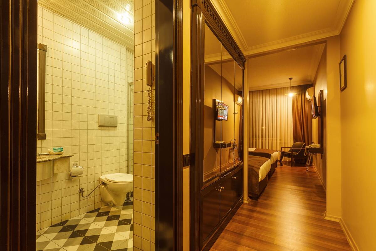 twin room, 2 single beds | bathroom | shower, free toiletries, hair dryer, slippers
