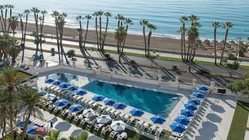 Seasonal outdoor pool, pool umbrellas, sun loungers