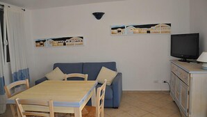 Apartment, 2 Bedrooms, Sea View | Living area - Villa Moreno 25 (Budoni)