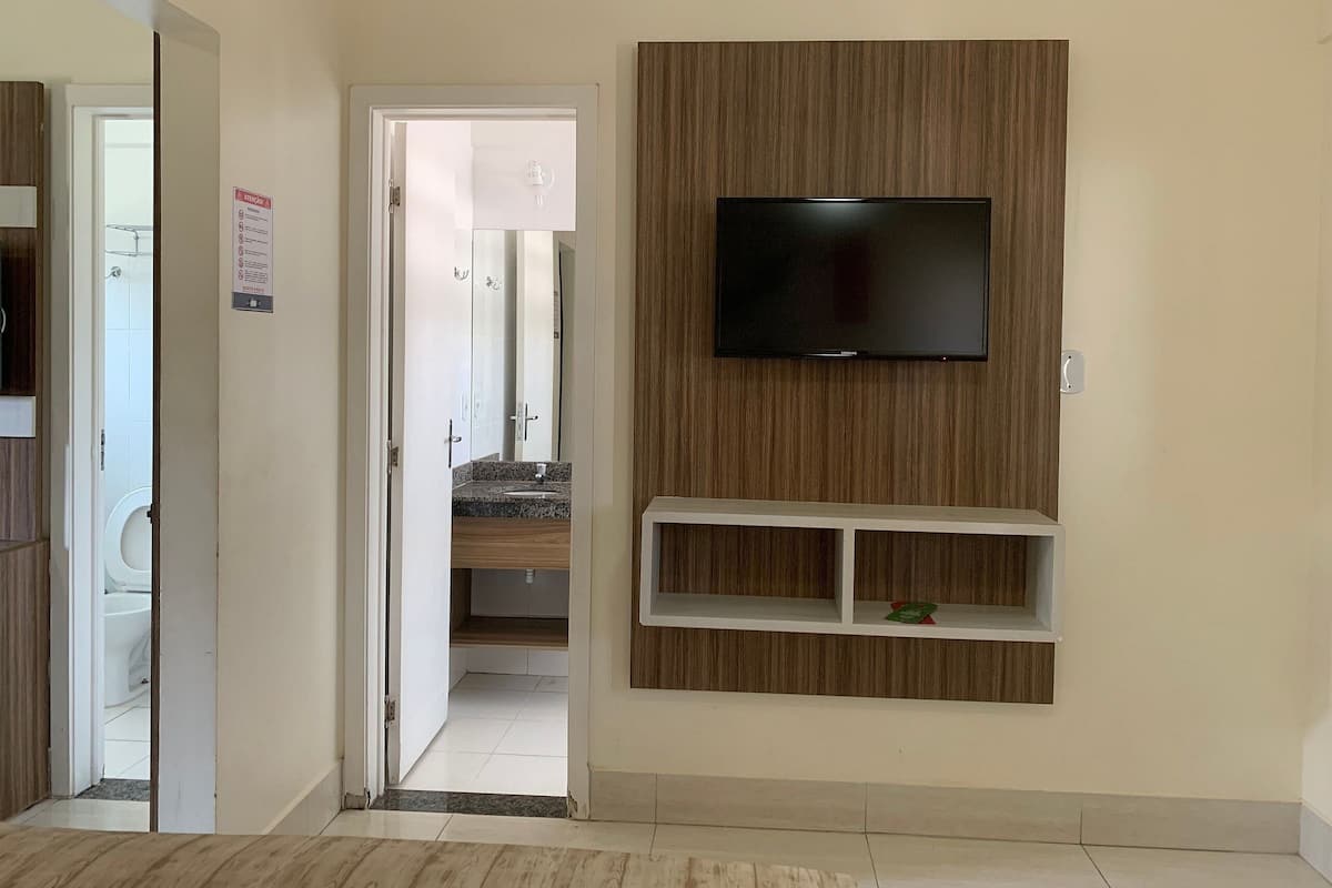 Apartment | Minibar, blackout drapes, free WiFi