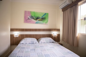 Apartamento | Frigobar, cortinas blackout, Wi-Fi de cortesia