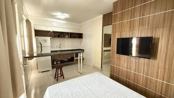 Apartamento | Frigobar, cortinas blackout, Wi-Fi de cortesia