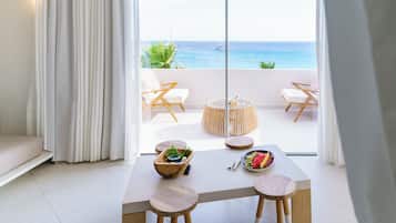 Fantasy Dream suite with private pool and sea view | Living area | 31-inch flat-screen TV with cable channels, TV