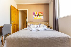Premium bedding, down comforters, in-room safe, desk - Q-Inn Boutique Hotel (Paramaribo)