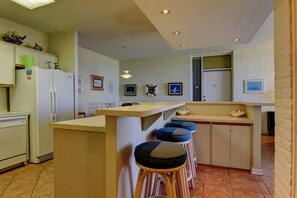 Condo, 2 Bedrooms | Private kitchen | Fridge, microwave, coffee/tea maker