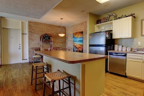 Condo, 2 Bedrooms | Private kitchen | Fridge, microwave, oven, stovetop