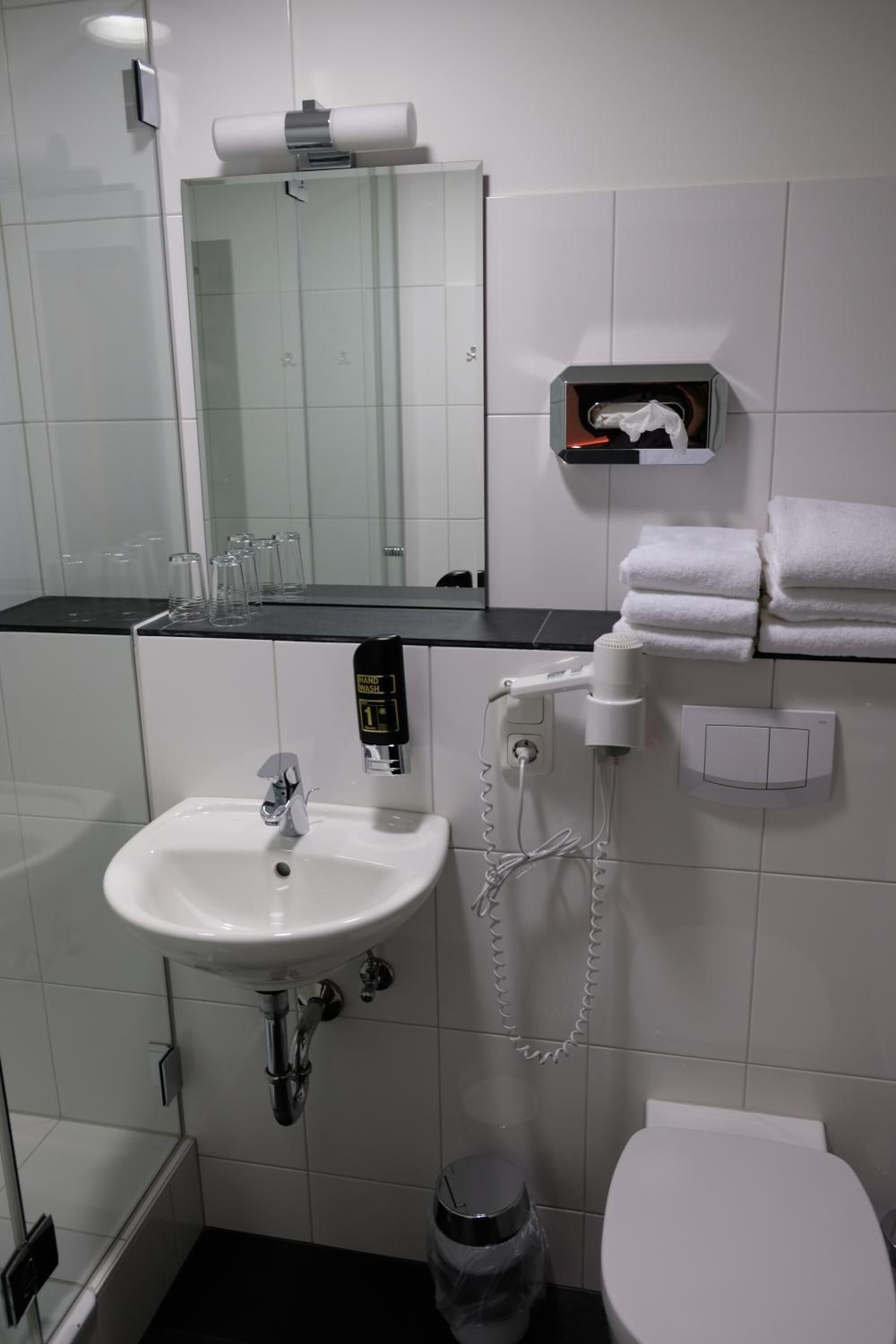 shower, free toiletries, hair dryer, towels