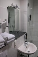 Shower, free toiletries, hair dryer, towels