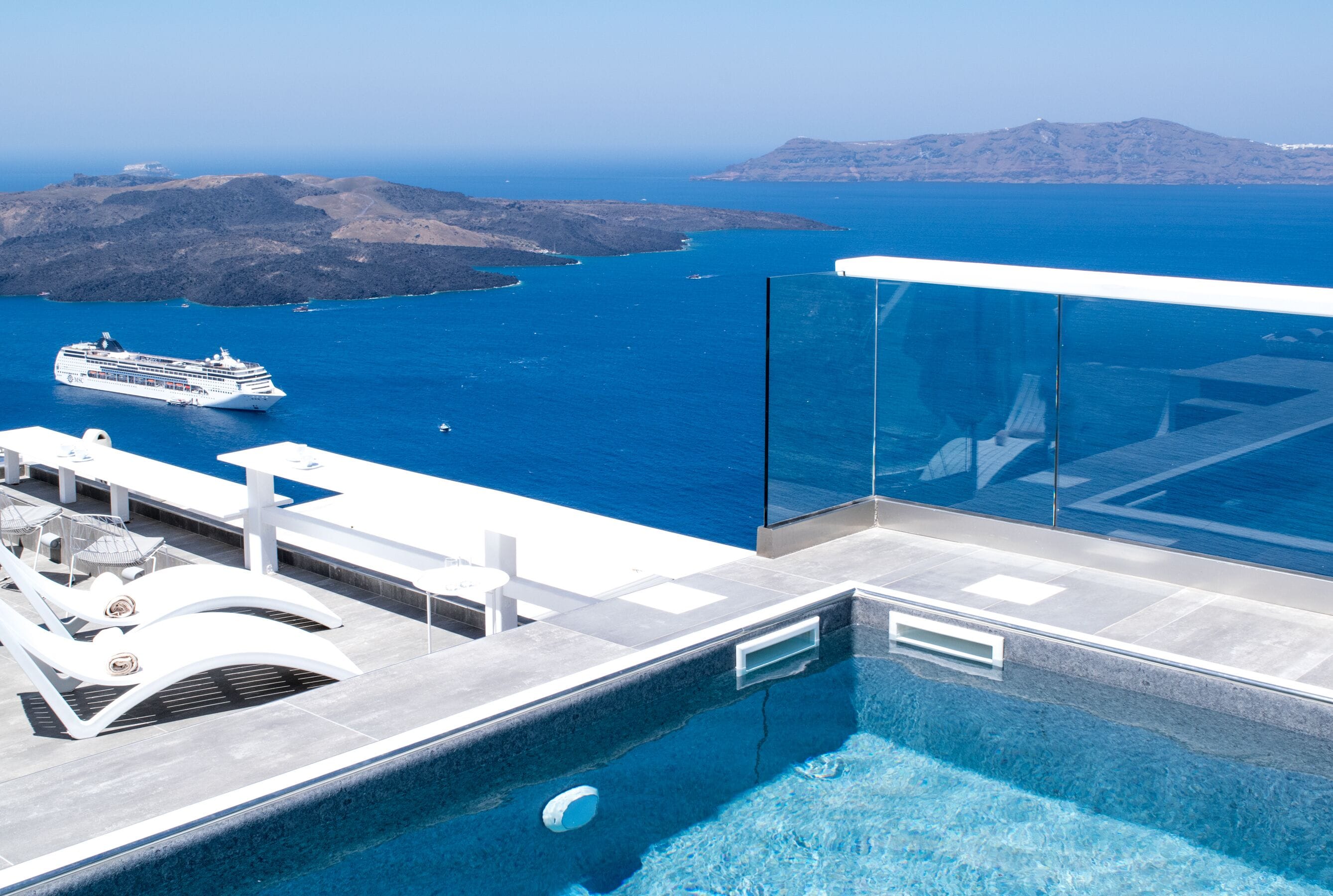 outdoor pool, pool umbrellas, pool loungers