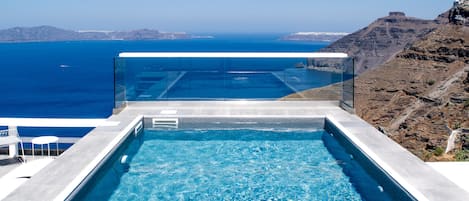 Outdoor pool, pool umbrellas, pool loungers