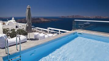 Outdoor pool, pool umbrellas, sun loungers