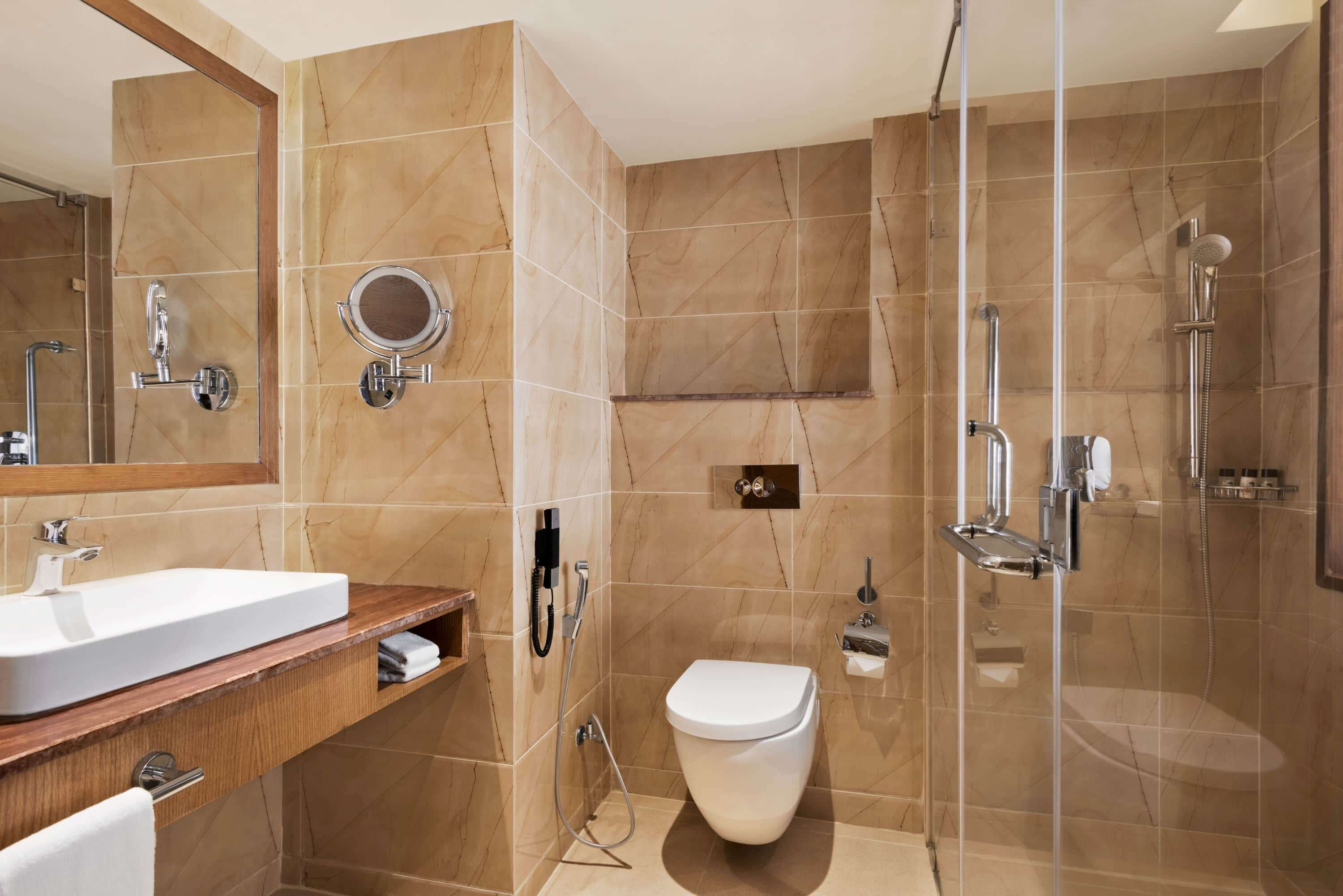 shower, designer toiletries, hair dryer, towels