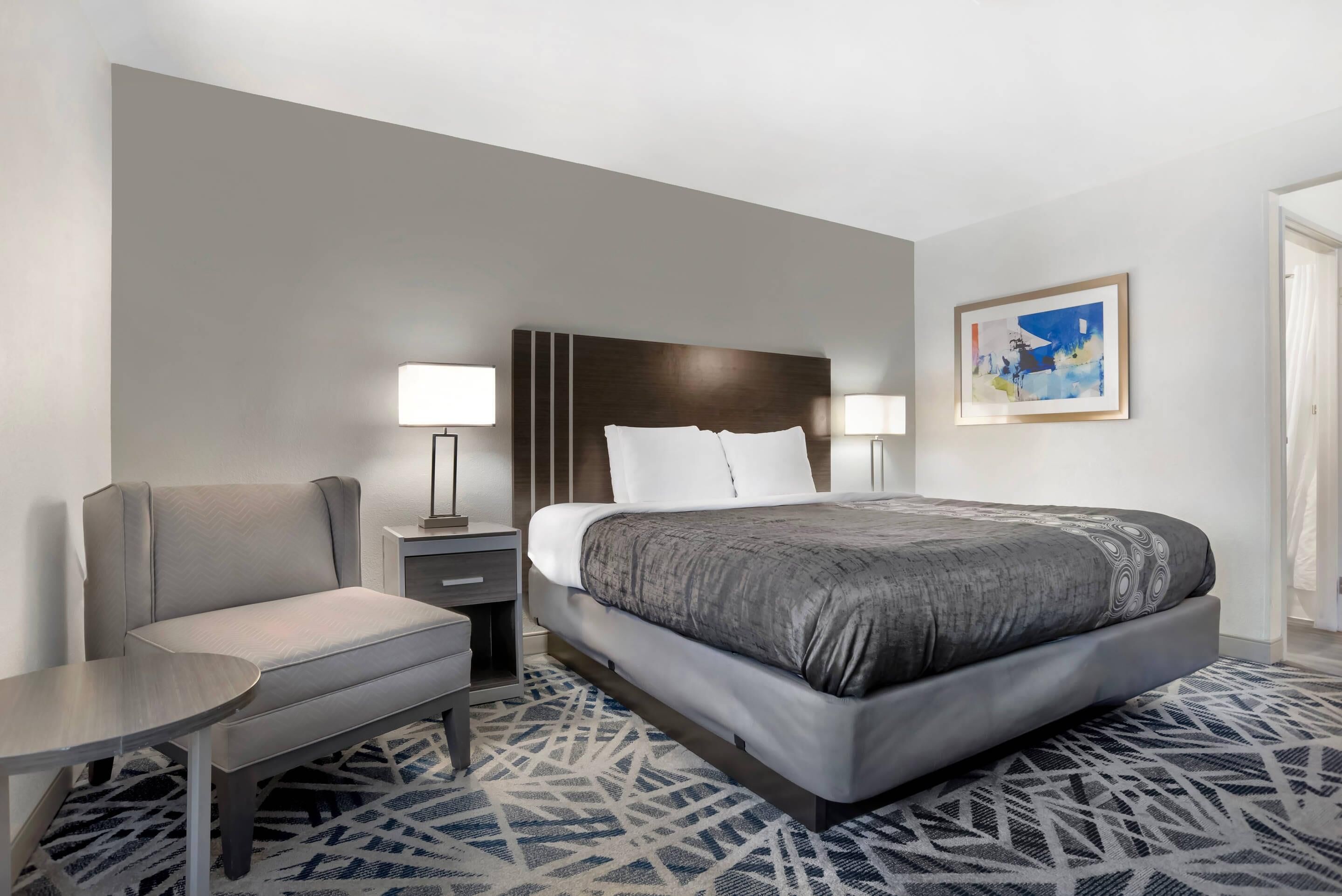 Desk, laptop workspace, blackout curtains, iron/ironing board