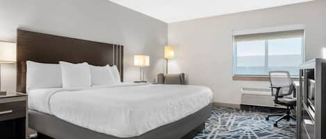 Suite, 1 King Bed with Sofa bed, Non Smoking | Desk, laptop workspace, blackout curtains, iron/ironing board